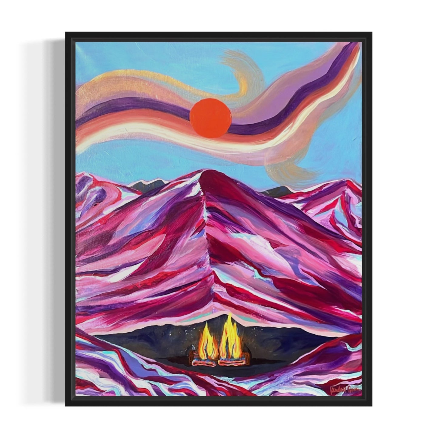 Colorful abstract painting of mountains and a sunset with a black frame.