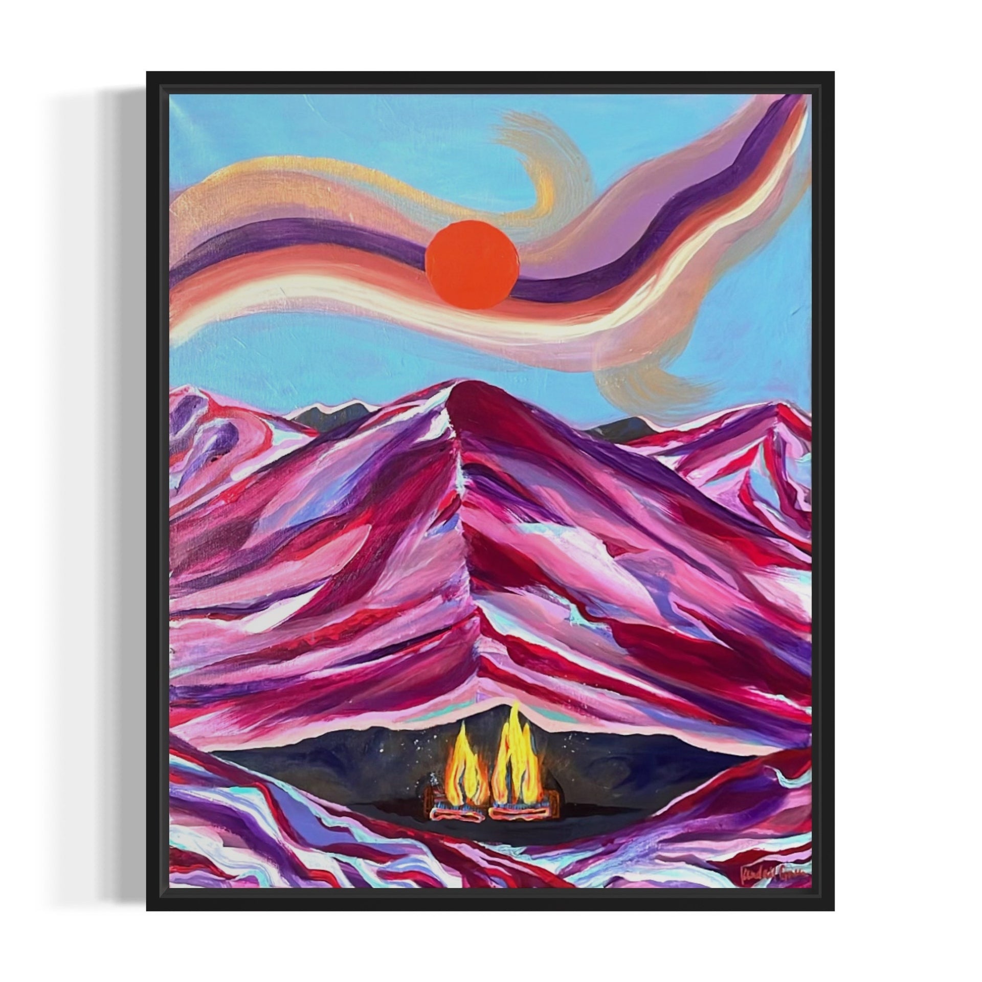 Colorful abstract painting of mountains and a sunset with a black frame.