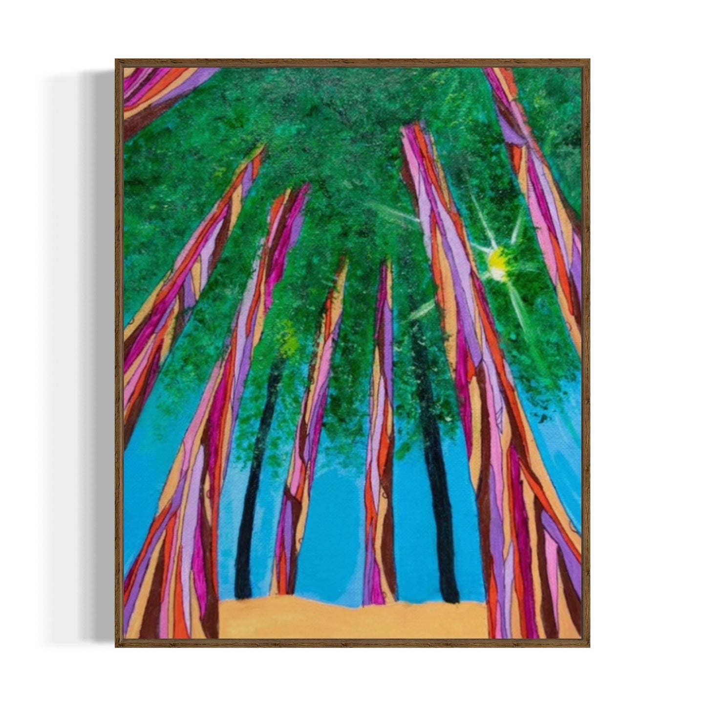 Framed artwork of colorful trees against a blue sky